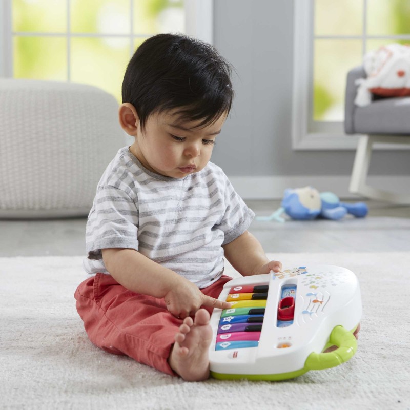 Fisher-Price Pianoforte di Cagnolino Ridi & Impara Edizione Multilingue, Portatile con Luci, Versi degli Animali, Contenuti