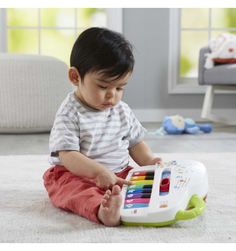 Fisher-Price Pianoforte di Cagnolino Ridi & Impara Edizione Multilingue, Portatile con Luci, Versi degli Animali, Contenuti