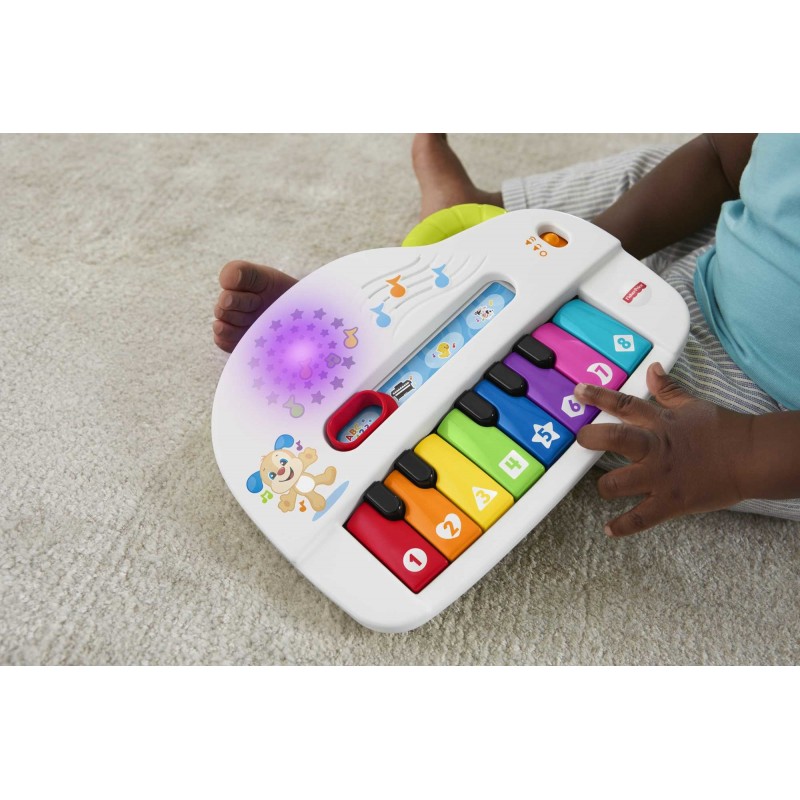 Fisher-Price Pianoforte di Cagnolino Ridi & Impara Edizione Multilingue, Portatile con Luci, Versi degli Animali, Contenuti