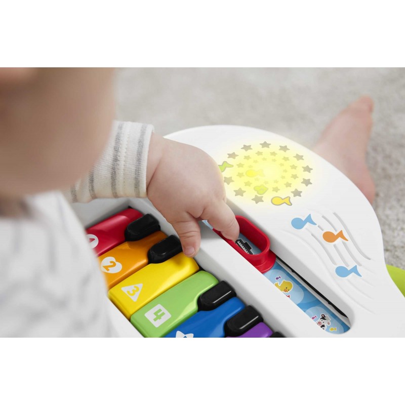 Fisher-Price Pianoforte di Cagnolino Ridi & Impara Edizione Multilingue, Portatile con Luci, Versi degli Animali, Contenuti