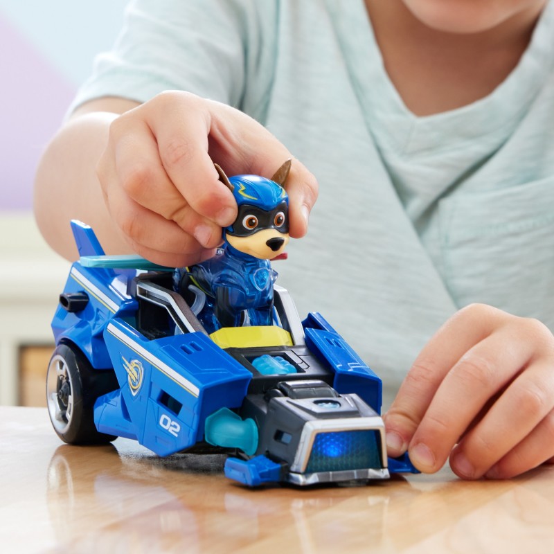 PAW Patrol La patrulla canina la Superpelícula, coche de juguete con figura de acción de Chase de Mighty Pups, luces y