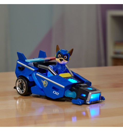 PAW Patrol La patrulla canina la Superpelícula, coche de juguete con figura de acción de Chase de Mighty Pups, luces y